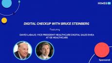 Bruce Steinberg and VP of healthcare digital sales for EMEA at GE Healthcare David Labajo